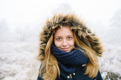 Portrait of woman in snow