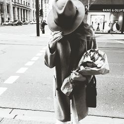 Woman standing on street