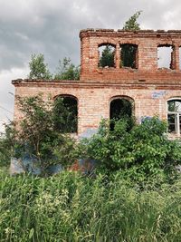 Low angle view of old building against sky