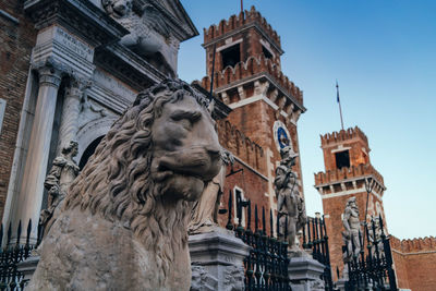 Low angle view of statue of historic building