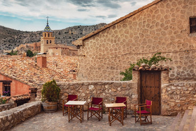 Albarracín is a town in the hills of east-central spain, above a curve of the guadalaviar river.