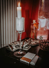 Close-up of wine glasses on table