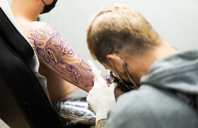 Midsection of man with hands