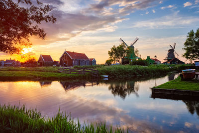 Windmills at zaanse schans in holland on sunset. zaandam, nether