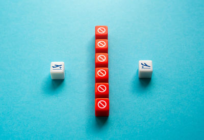 Close-up of dices on blue background