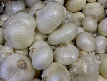 Full frame shot of onions for sale in market