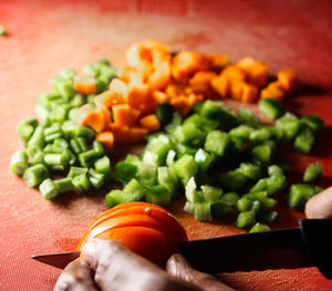 High angle view of chopped vegetables on cutting board