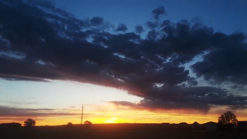 Scenic view of dramatic sky during sunset