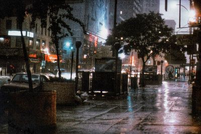 Illuminated buildings in city at night
