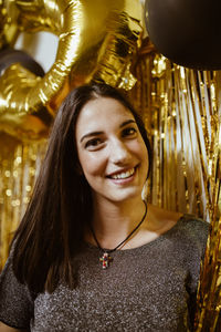 Portrait of beautiful female celebrating new year eve