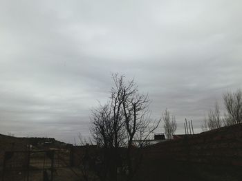 Built structure against cloudy sky