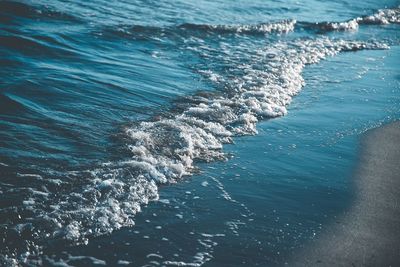 High angle view of water splashing in sea