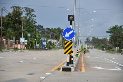 Road sign by street