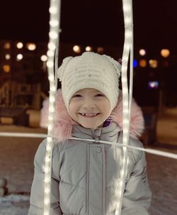 Portrait of smiling girl in snow