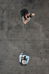 High angle view of men photographing outdoors