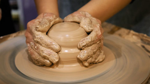 Close-up of man preparing food