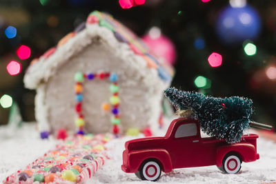 Close-up of toy car on christmas tree