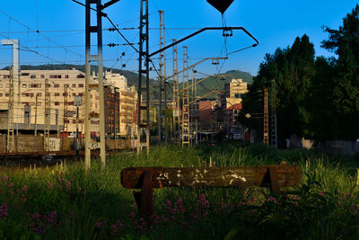 Buildings against blue sky at dusk