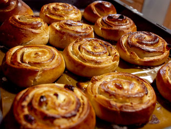 Homemade baking. cinnabon's. world renowned brand, the most delicious. cinnamon rolls. 