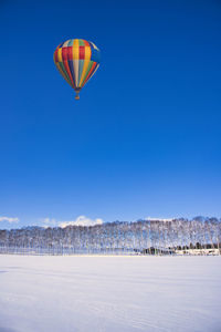 Snowy scenery with hot air balloon of eastern hokkaido