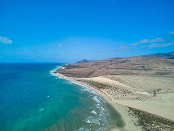 Aerial atlantic ocean and the coastline in sotavento beach fuerteventura island drone photography