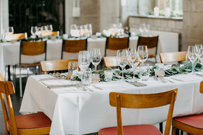 High angle view of tables and chairs in restaurant