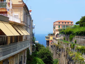 View of residential buildings against clear sky