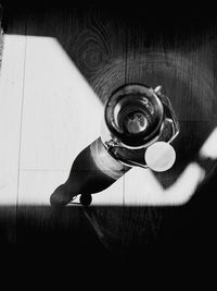 High angle view of coffee cup on table