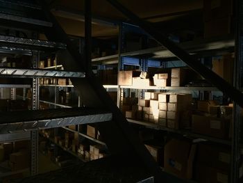 View of staircase in city at night