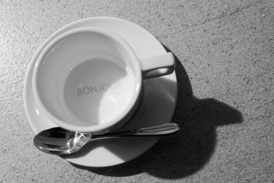 High angle view of coffee cup on table