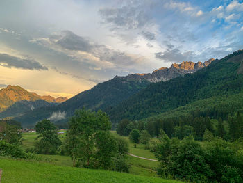 Scenic view of landscape against sky during sunset