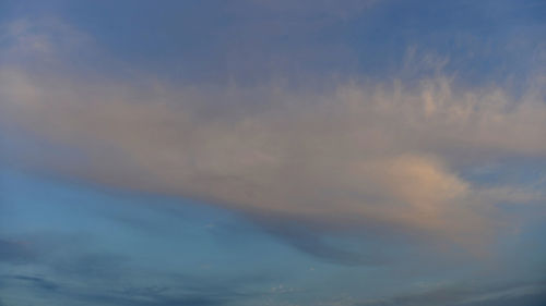 Low angle view of cloudy sky during sunset