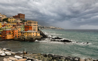The old fishing village with dry boats on the quay in autumn, boccadasse, genoa, liguria, italy