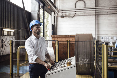 Young man working at construction site