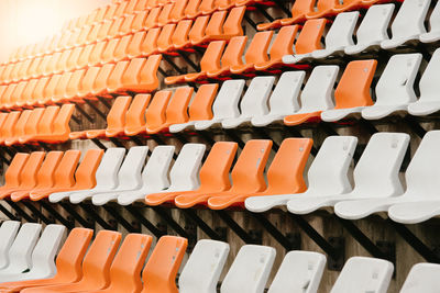 Full frame shot of empty chairs in stadium