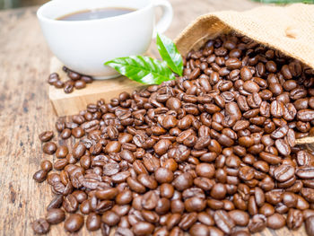 Close-up of coffee beans on table