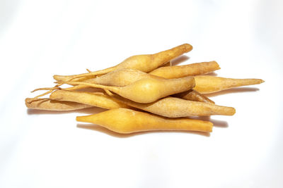 Close-up of cake against white background