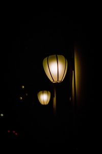 Close-up of illuminated electric lamp