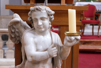 Angel on the altar in franciscan church of the friars minor in dubrovnik, croatia