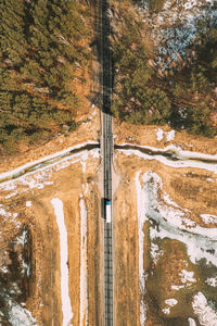 High angle view of road by trees in forest