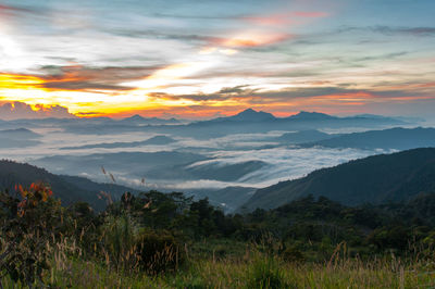 Scenic view of landscape against sky during sunset