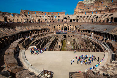 View of the interior of the roman colosseum showing the arena and the hypogeum in a sunny day