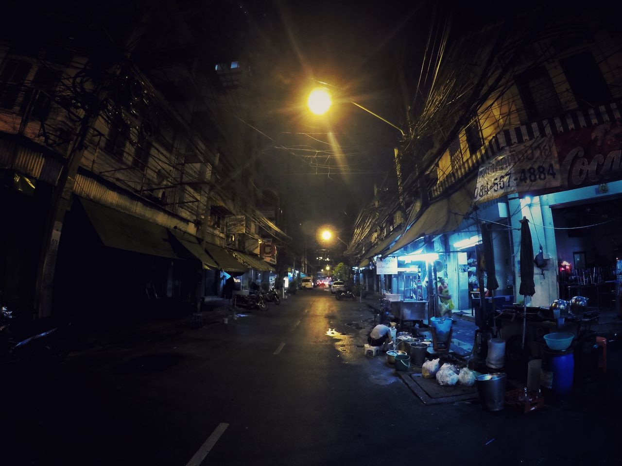 CARS ON ROAD IN CITY AGAINST SKY AT NIGHT