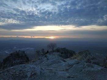 Scenic view of landscape against sky during sunset