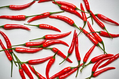 High angle view of red chili peppers on table