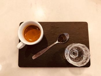 High angle view of coffee cup on table