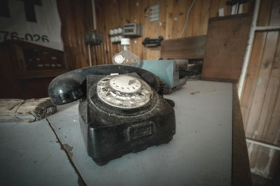 Close-up of old telephone booth