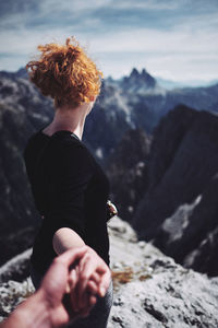 Rear view of woman looking at mountain