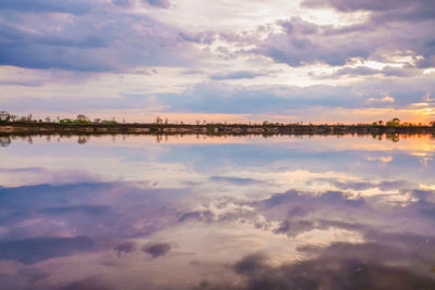 Scenic view of lake against sky during sunset