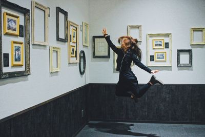 Woman with arms raised